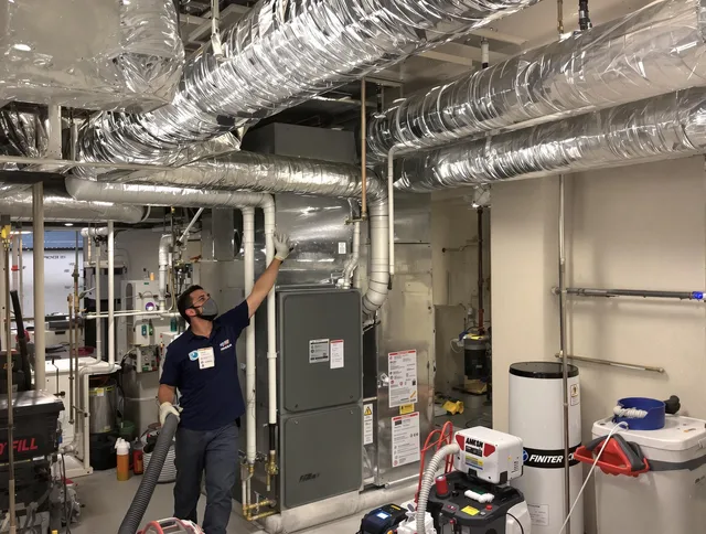 Fairhaven Air Duct Cleaning specialist performing thorough furnace duct cleaning in a Fairhaven residence
