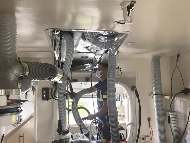Fairhaven Air Duct Cleaning specialist performing precise mobile home duct cleaning in Fairhaven