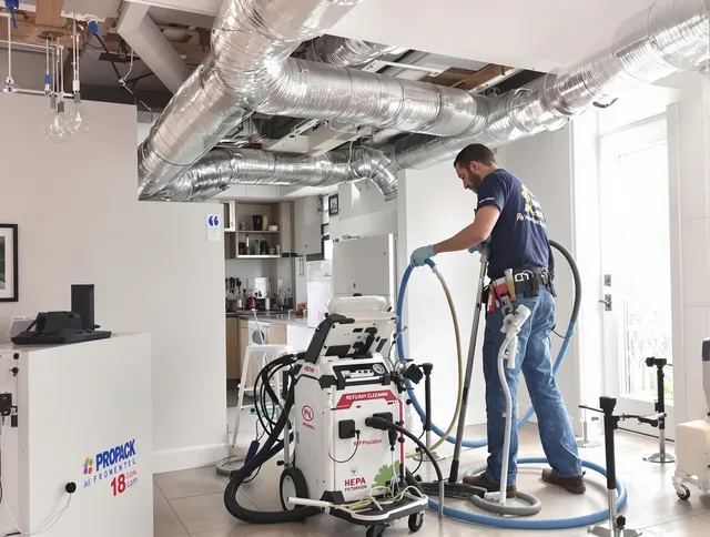 Fairhaven Air Duct Cleaning technician performing advanced pure duct cleaning with specialized equipment in Fairhaven